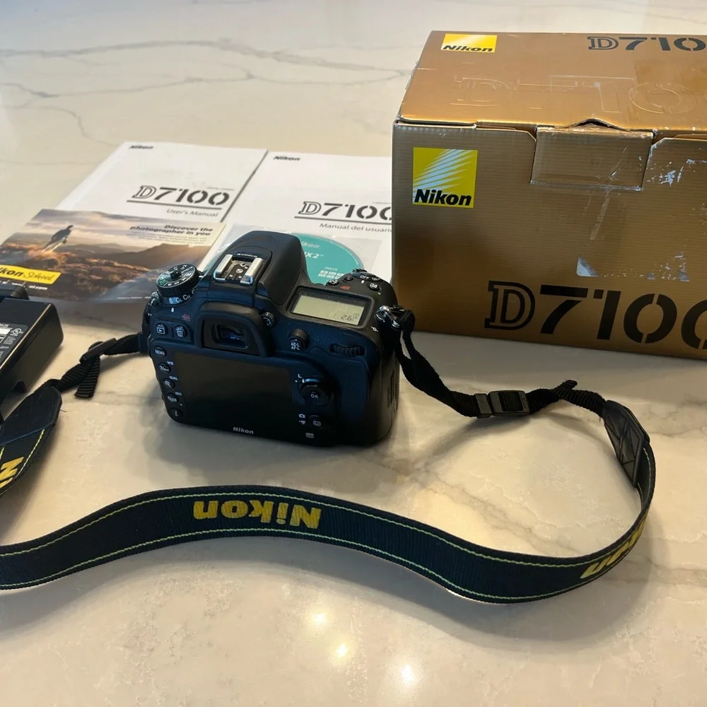 Nikon D7100 camera, 4 lenses, Flash, battery, charger and Wi-FI connector